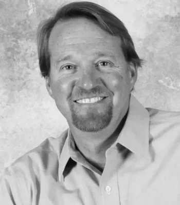 Portrait of Greg Harrigan, REALTOR®, Certified Negotiation Expert.